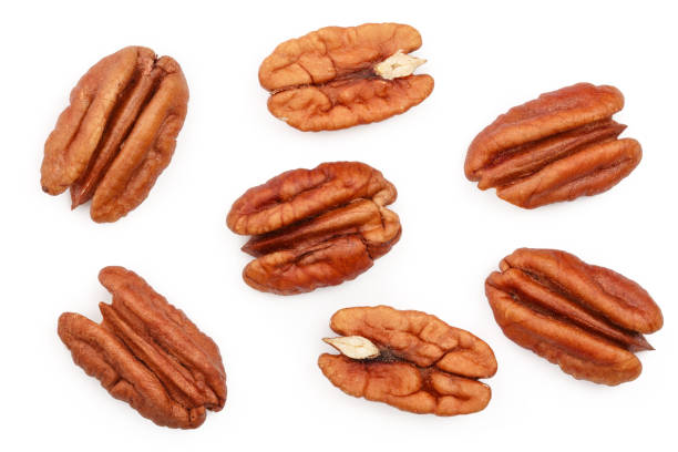 istock pecan nut isolated on white background. Top view. Flat lay 1127046504