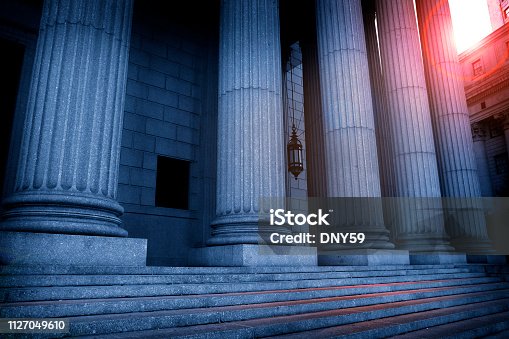 istock Greek Columns At A Courthouse In The Late Afternoon 1127049610