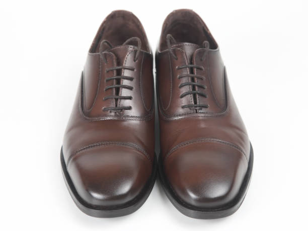 istock Classic men's brown Leather shoes on white background 1127049657