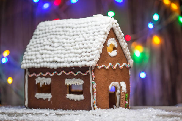 istock Christmas ginger bread house with bulbs background for graphic and web design, Modern simple internet concept. Trendy for website design web or mobile app. 1127051644