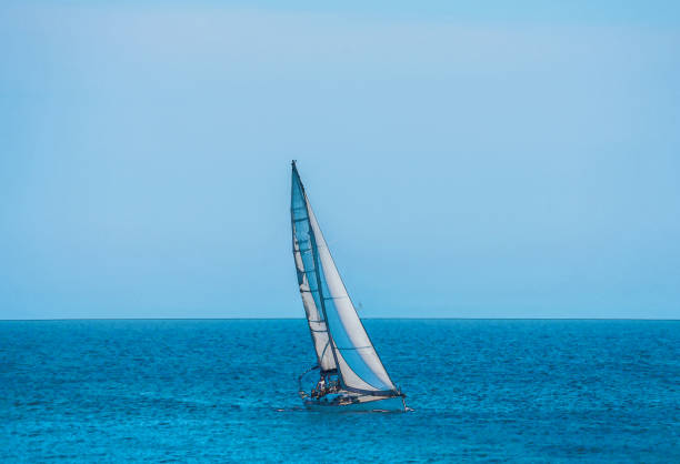 sailing boat flowing on the open sea, watercolor painted, illustration
