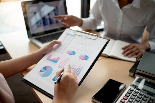 istock business executives negotiate meeting in modern office discussing a quality data. 1127055437