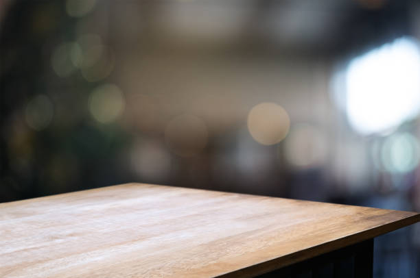 istock wooden table with blurred modern home background. 1127055485