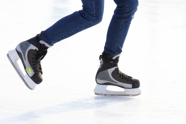 istock Feet skating on the ice rink 1127057113