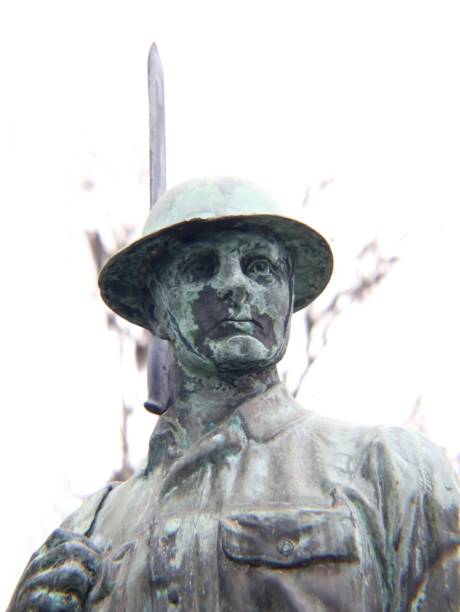istock Soldier statue on a bridge weather worn and lifelike 1127059323