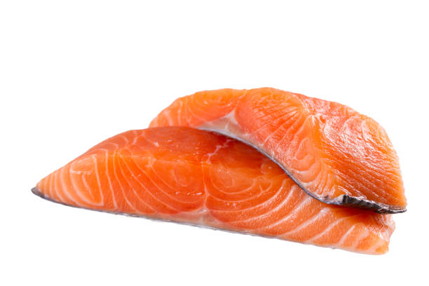 istock Fresh salmon fish isolated on white background without shadow 1127059375