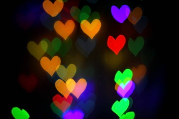 istock colorful bokeh, garland on a dark background 1127059408