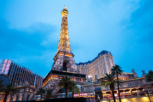 Las Vegas, Nevada, Usa - January 6, 2019 - Low angle view of an illuminated Eiffel Tower on the Las Vegas Strip at night. Replica of the Eiffel Tower is 541 ft (165 m) tall.