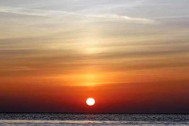 istock sunset in an unusual colors on the sea 1127061937