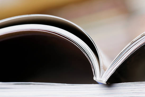 istock Open book close up at the library 1127068980