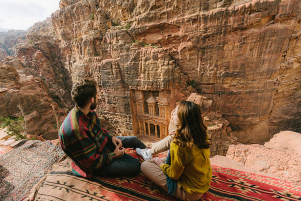 Couple looking at Al-Khazneh in Petra