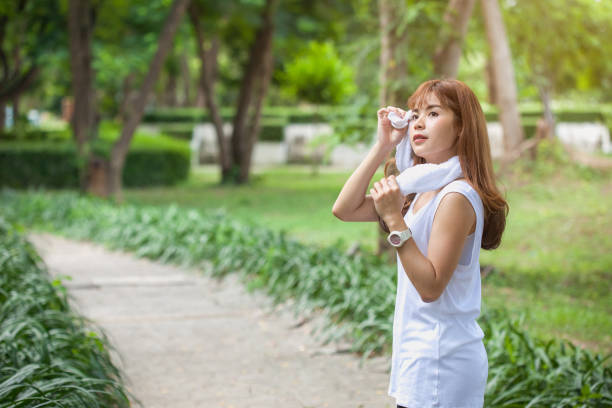 istock Woman exercising in the park. 1127076798