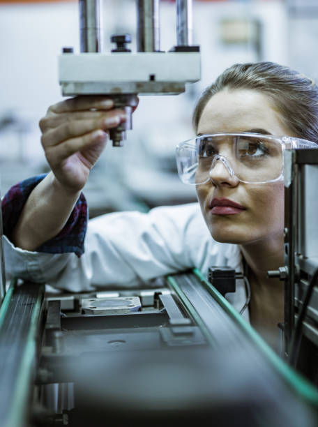 istock Female engineer examining machine part on a production line. 1127076860