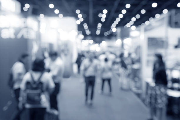 istock Abstract blurred event exhibition with people background, business convention show concept 1127078445