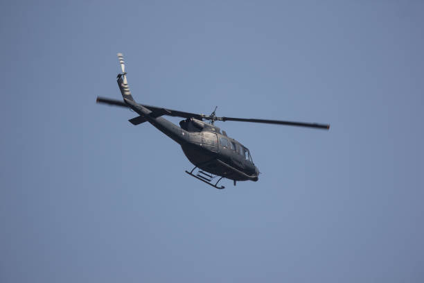 Chiangmai, Thailand - January 18 2019: Bell UH-1H Iroquois (205) of Royal Thai Air force. Photo Over Chiangmai City.