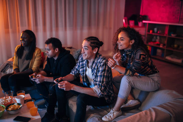 istock Group of friends playing video games 1127081647