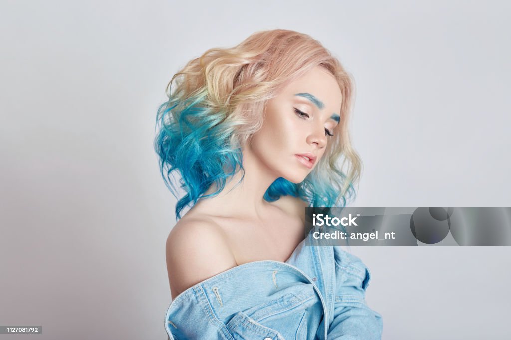 Portrait Woman With Bright Colored Flying Hair All Shades Purple Blue Hair Coloring Beautiful Lips And Makeup Hair Fluttering In Wind Sexy Girl With Short Hair Professional Creative Coloring Stock Photo - Portrait Woman With Bright Colored Flying Hair All Shades Purple Blue Hair Coloring Beautiful Lips And Makeup Hair Fluttering In Wind Sexy Girl With Short Hair Professional Creative Coloring Stock Photo -