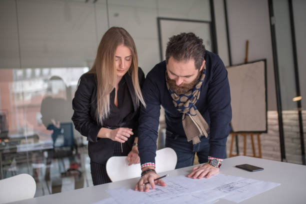 istock Portrait of architects having discussion in office 1127082787