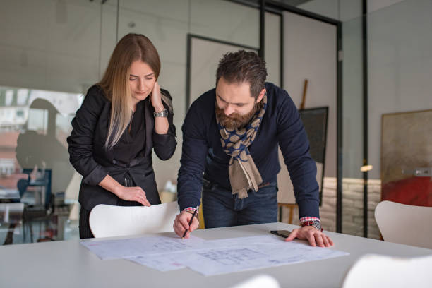 istock Portrait of architects having discussion in office 1127082897
