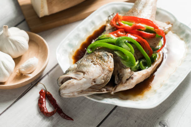 istock Chinese traditional food, steamed weever 1127084088