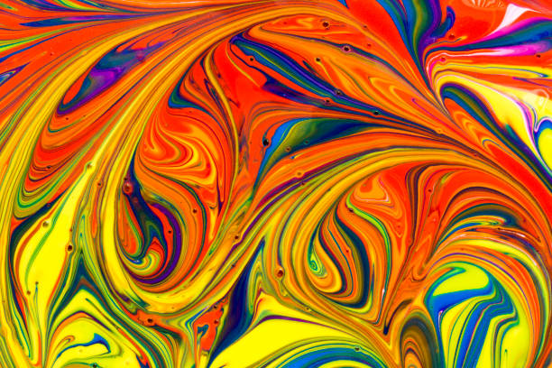 istock Abstract textured background of multicolored paint swirls 1127085028