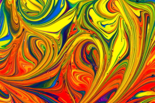 istock Abstract textured background of multicolored paint swirls 1127085137