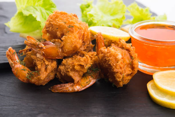 istock Tiger shrimp fried in Tempura with vegetables 1127086090