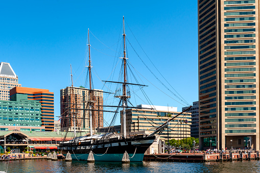Baltimore's Inner Harbor Harborplace, World Trade Center and the 1854 USS Constellation 3 mast sloop-of-war.