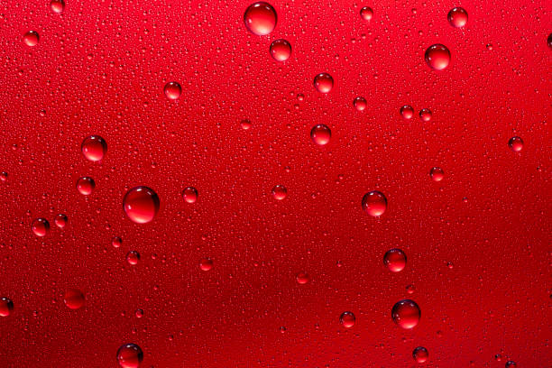 istock Beads of water on glass 1127089968