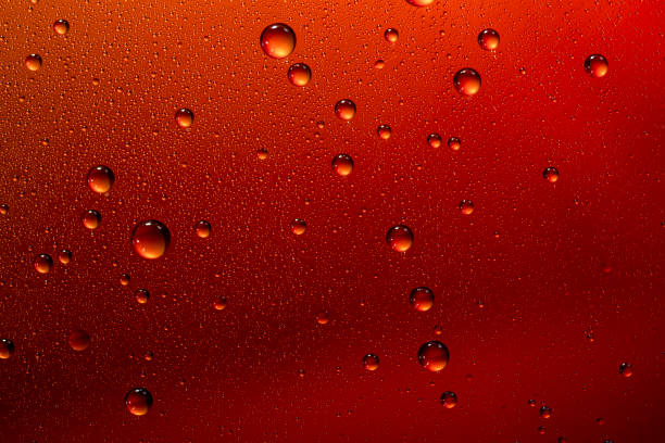istock Beads of water on glass 1127090077