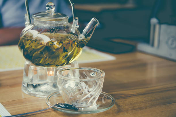 istock glass teapot and glass cup with herbal tea 1127092981