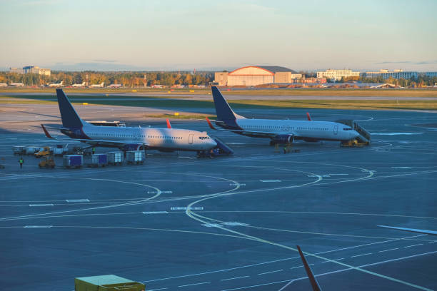 istock Two planes are at the airport waiting for service. 1127094275