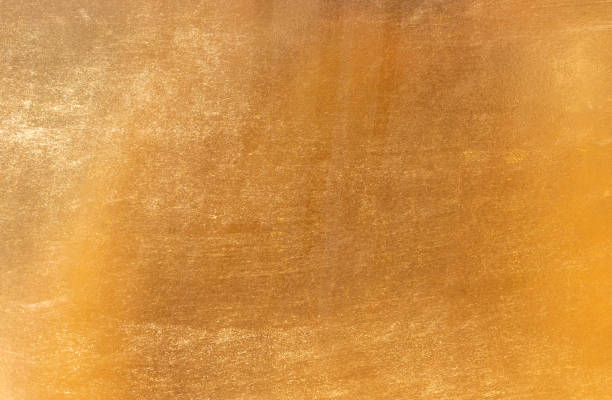 istock Shiny yellow leaf gold metall texture and background 1127095215