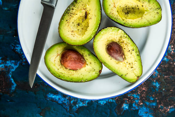 istock Overhead view of freshly prepared avocados 1127095227
