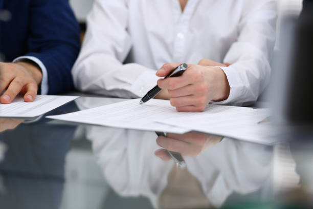 istock Bookkeepers team or financial inspectors  making report, calculating or checking balance. Group of people at work. Business operations concept 1127095378