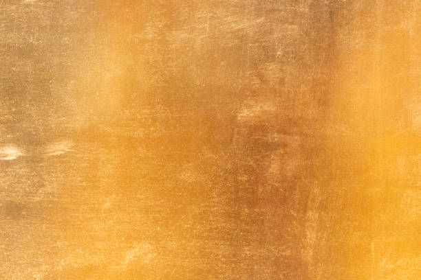 istock Shiny yellow leaf gold metall texture and background 1127095881