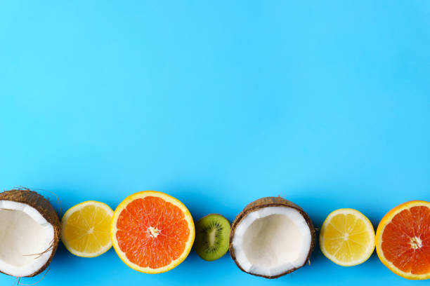 istock summer composition with exotic fruits, vacation 1127097746