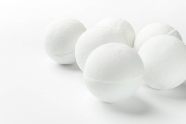 istock Handmade salt bath bombs in balls shape from organic vegan natural ingredients on white background. Spa wellness body care wellbeing concept. Clean minimalist style. Copy space 1127098314