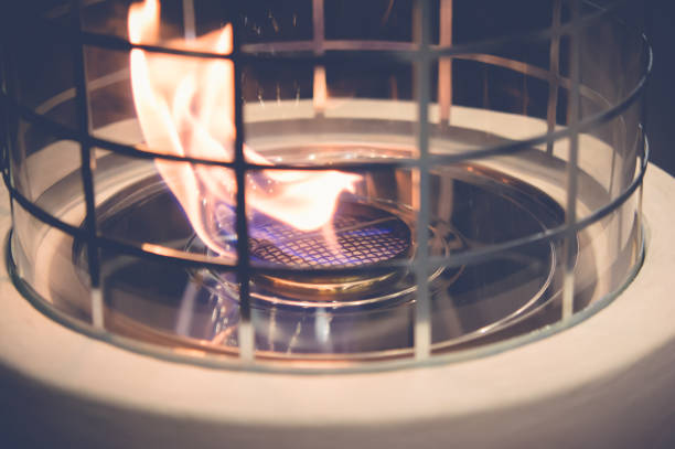 istock Modern bio fireplot fireplace on ethanol gas. Flame gas stove cl 1127098806