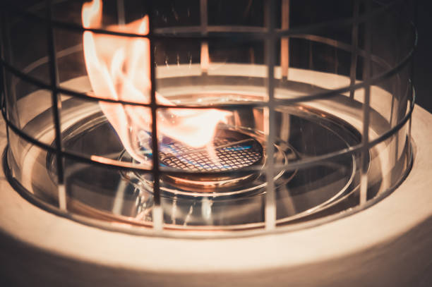 istock Modern bio fireplot fireplace on ethanol gas. Flame gas stove cl 1127098819