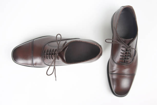 istock Classic men's brown Leather shoes on white background 1127104794