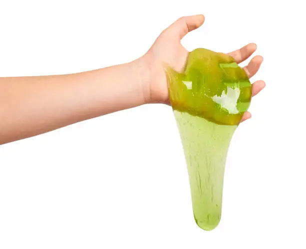 teenager playing green slime with hand, transparent toy. Isolated on white background