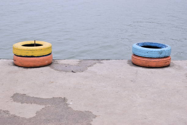 tires for boat on the beach cloudy sky