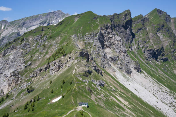 istock Col de Cou (Barme, Champery, Switzerland) is a known bird migration route. On the col is a bird observation station. 1127107633