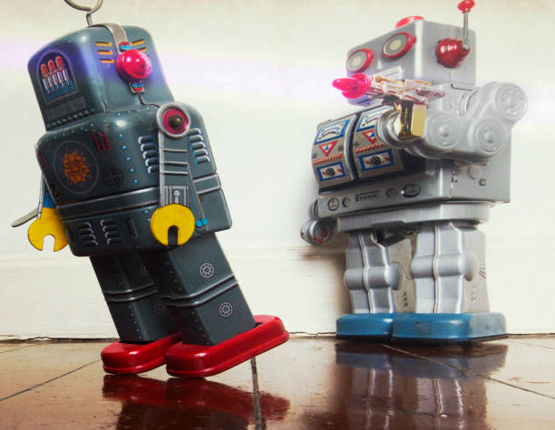 istock concept being shot with vintage robot toys o 1127109183