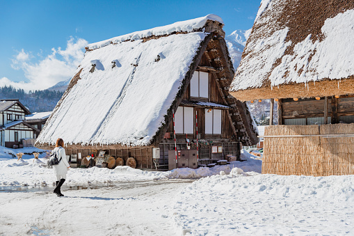 Gifu, Japan - January 11, 2019 : Traditional village and House Gassho style cottage of UNESCO world heritage sites in Shirakawa-go village, the area with white snow cover on winter season at Gifu, Japan