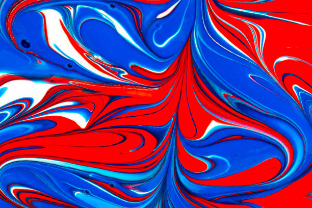 istock Abstract background of red, white and blue paint swirls 1127111528