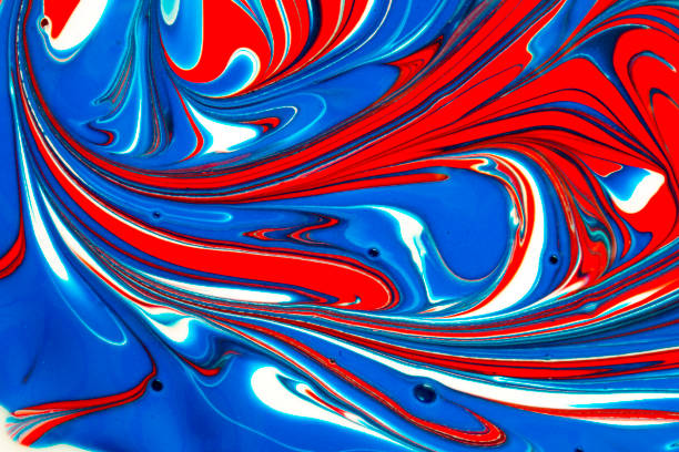 istock Abstract background of red, white and blue paint swirls 1127111602