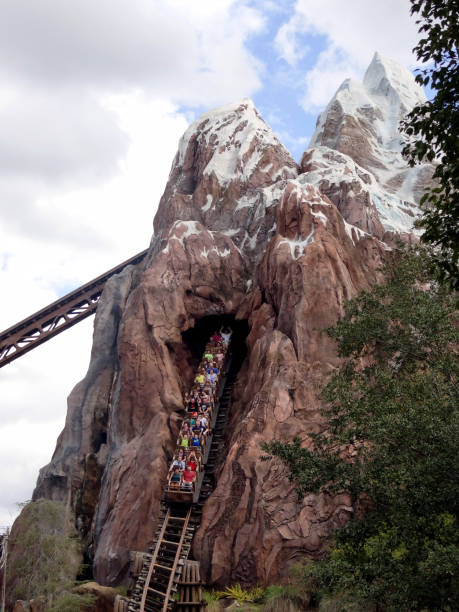 Orlando, Florida - February 01, 2016: Legend of the Forbidden Mountain; a steel roller coaster built by Vekoma at the Disney Animal Kingdom theme park at the Walt Disney World Resort at Lake Buena Vista in Florida. The journey is themed around the Yeti; which protects the Forbidden Mountain next to Mount Everest. The 2011 edition of Guinness World Records lists Expedition Everest; the world's most expensive roller coaster.