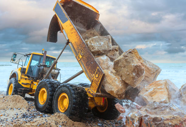 Dumper Truck on site Beach erosion control dump truck photos stock pictures, royalty-free photos & images